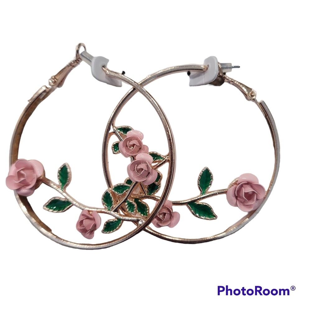 Gold hoop earrings with two stemmed pink roses in the middle.  Nickle fr…